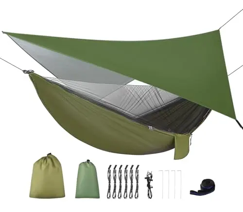 FIRINER green camping hammock with integrated mosquito net hanging in forest
