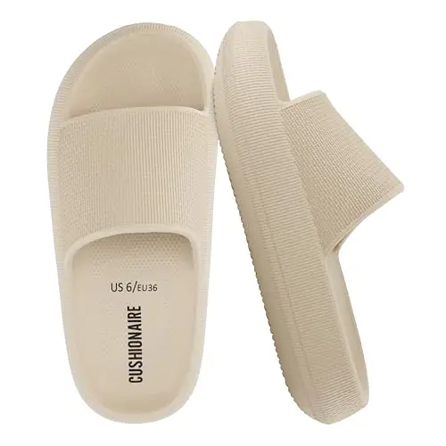 CUSHIONAIRE women's feather EVA slides in various colors showing lightweight design